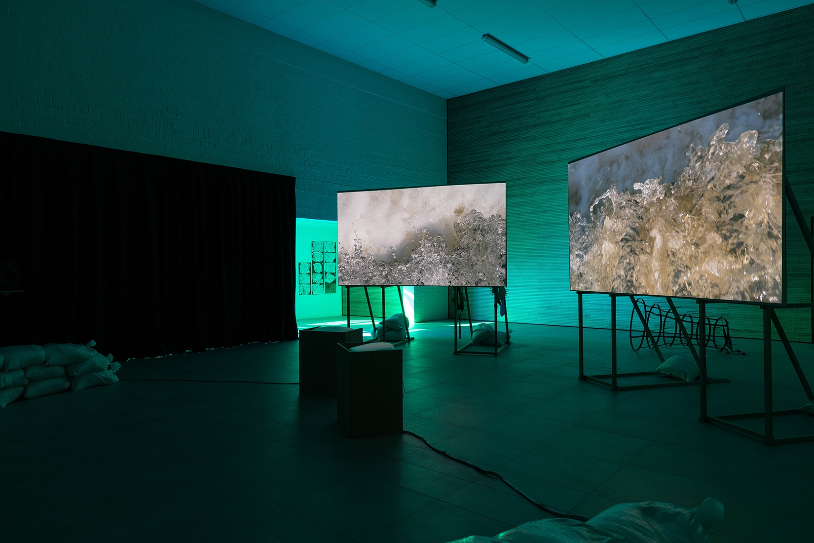 https://www.abrideswardt.com/files/gimgs/th-81_Installation view Abri de Swardt, Kammakamma (2022-2024), Synchronised two-channel projection, configurable screens, sand from Macassar Dunes, and costumes, 16’54 min 6.jpg